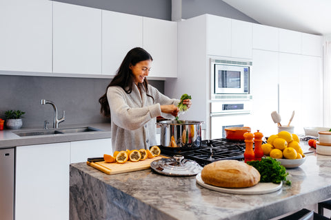 Woman in the kitchen cooking