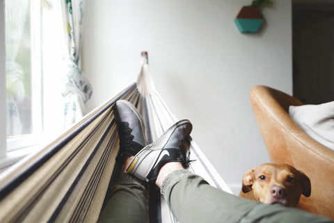 Person relaxing in a hammock